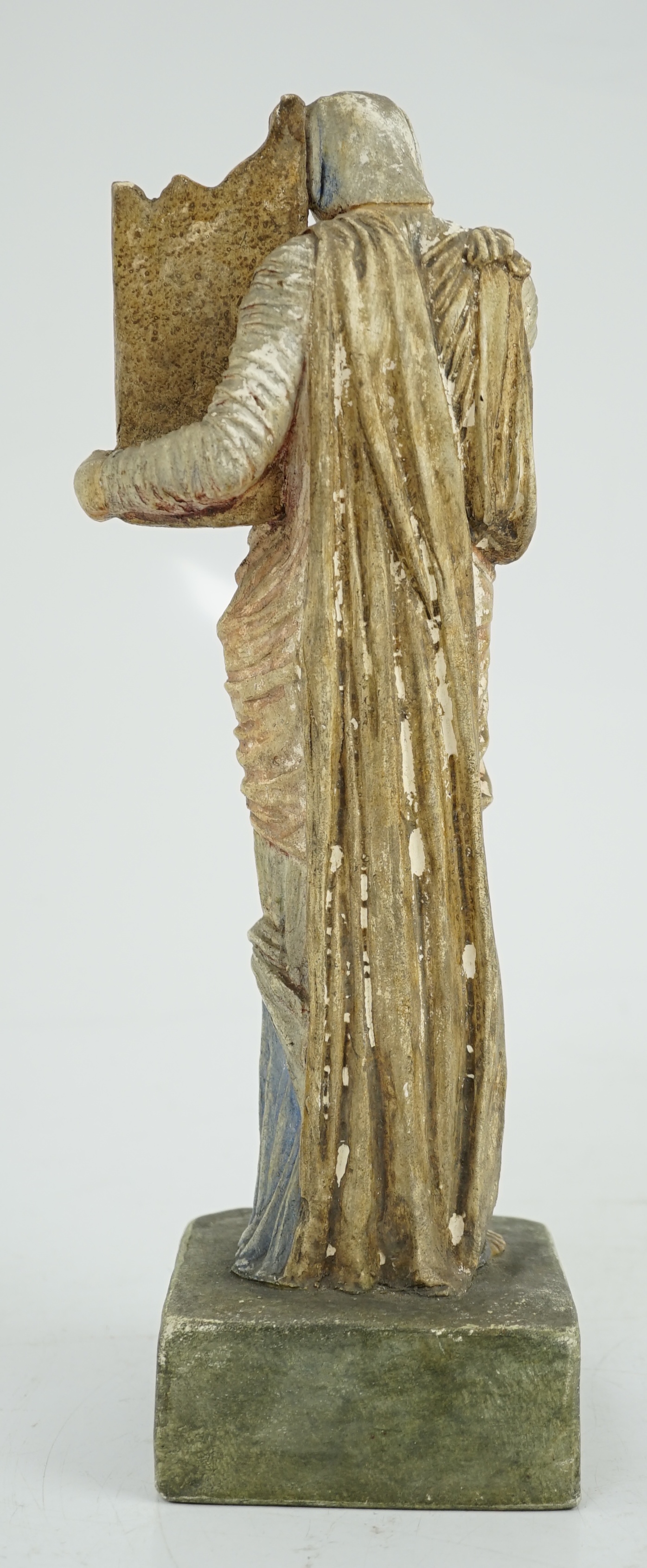A Compton tempera painted pottery figure of St Cecilia, early 20th century, losses to paint